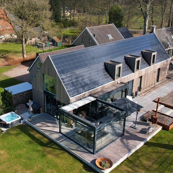 Realisatie oranjewoud - glazen terrasoverkapping met doek