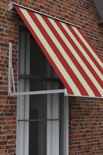 Carre uitvalscherm met rood-witte strepen gemonteerd aan bakstenen gevel Carre uitvalscherm met rood-witte strepen gemonteerd aan bakstenen gevel