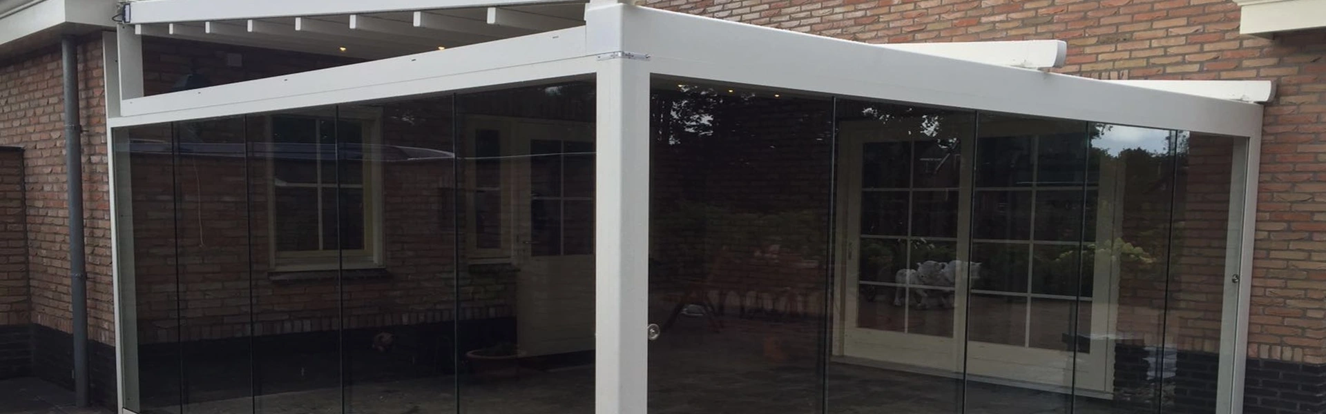 Veldman Zonwering glazen tuinkamer bij woning in Wolvega