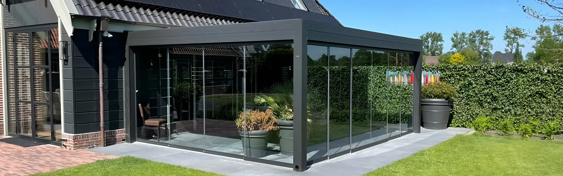 Veldman Zonwering glazen tuinkamer met schuifdak in Wognum