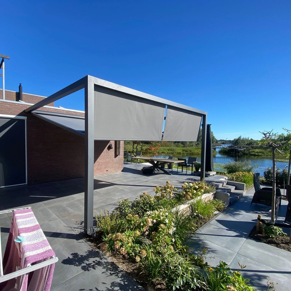 Veldman Zonwering textieloverkapping bij woning aan het Heidemeer met terras Veldman Zonwering textieloverkapping bij woning aan het Heidemeer met terras