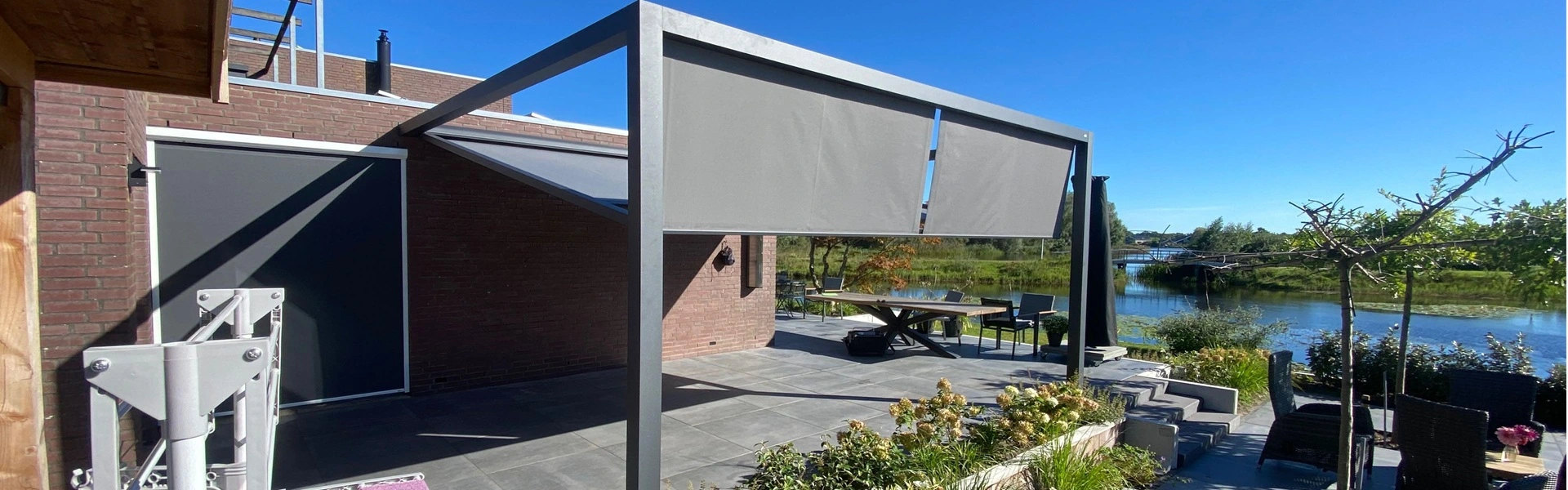 Veldman Zonwering textieloverkapping met uitzicht op Heidemeer terras
