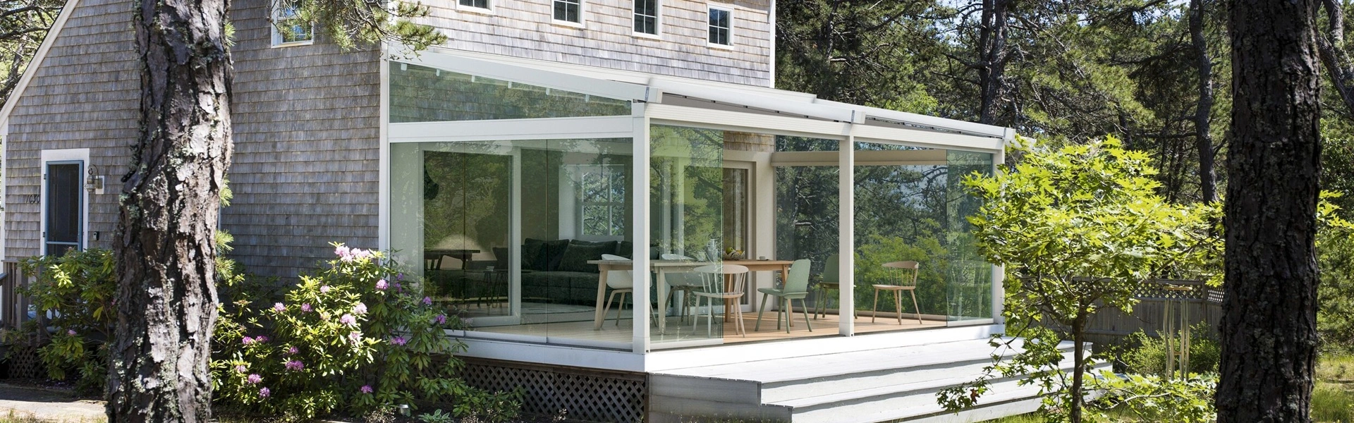 Viva schuifdak tuinkamer in een bosrijke omgeving