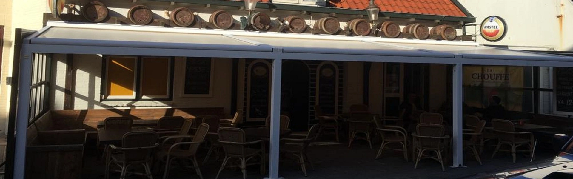 Terrasoverkapping met schuifdak door Veldman Zonwering bij 't Swintje in Egmond